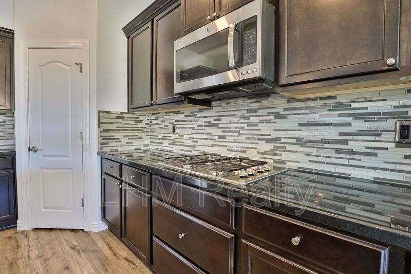 *Coming Soon* Luxurious 4 Bedroom Home with Pool, Fireplace, and Wine Cooler in Peoria, AZ property image